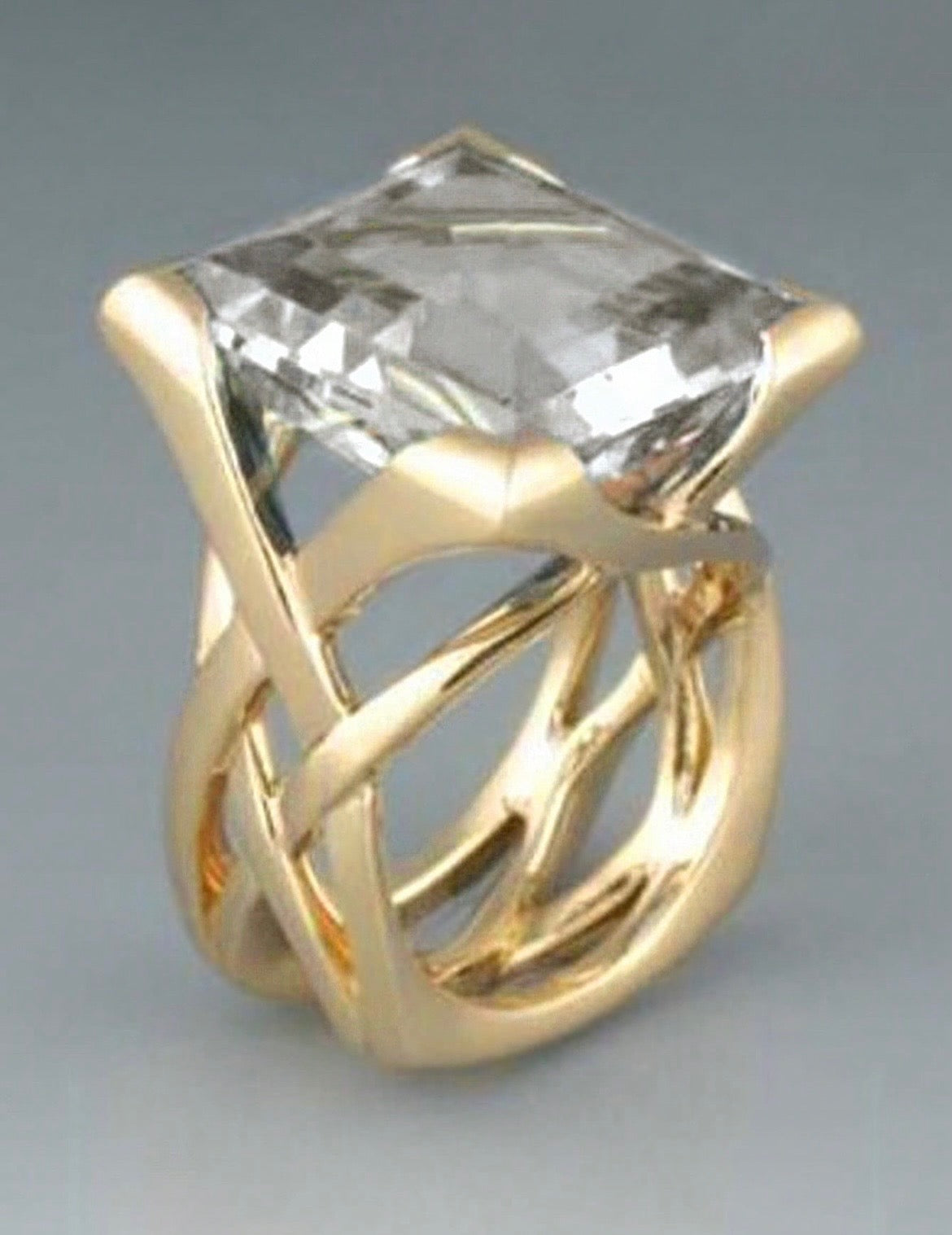 Gold Swirl Basket Weave Ring with Cushion Cut Stone